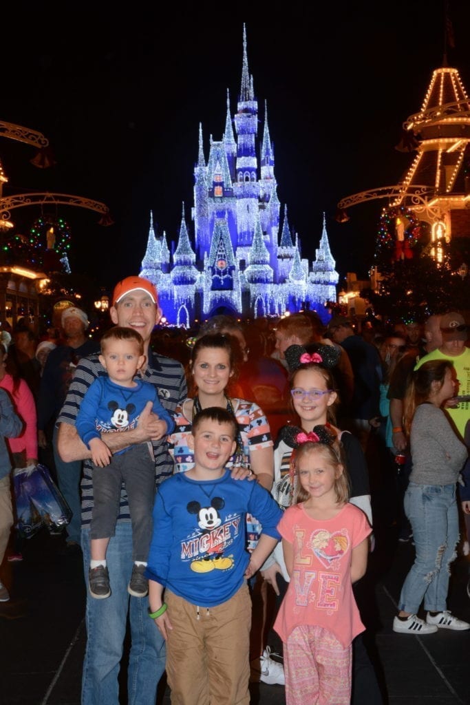 Family at Disney World Castle in Florida